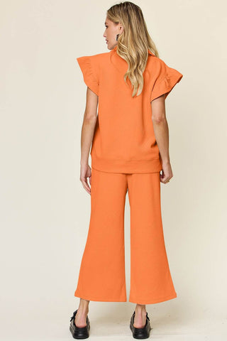 Double Take Texture Ruffle Short Sleeve Top and Drawstring Wide Leg Pants Set - Just Believe Boutique