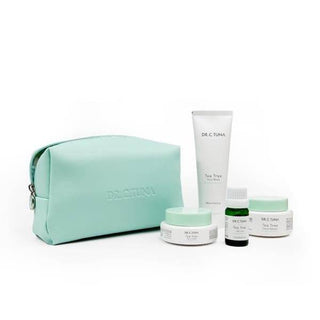 Dr. C. Tuna Tea Tree Bag Set with mint zip pouch, cream, lotion and oil