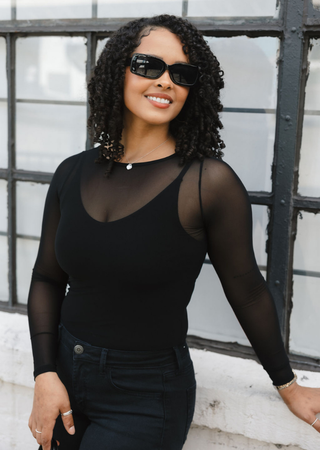 Elietian Seamless Sheer Mesh Top in Black with black jeans and sunglasses