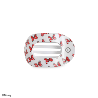 White round hair clip with red bow pattern and a 3-slot center.
