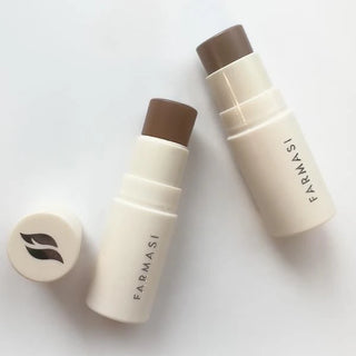 Creamy contour stick bottles with brown caps and FARMASI logo