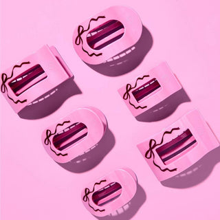 Set of large flat rectangle hair clips, pink with bow cutout and dark bar accents
