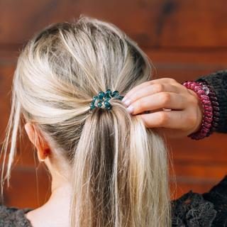 Teleties large spiral hair ties in Harvest Hues teal, berry plaid and burgundy, shown in hair