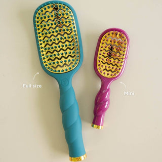 Teleties mini vented hair brush in Mulberry, shown with a full-size Teleties brush