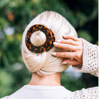 Teleties large flat circle hair clip in tortoise, shown in hair
