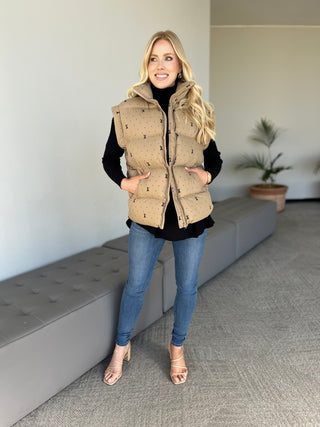 Ivory plus-size bow-pattern puffer vest with hood, sleeveless front view