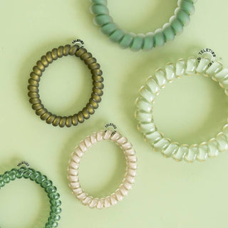 Teleties mixed spiral hair ties in Mossy Moments olive and sage green, shown as a set