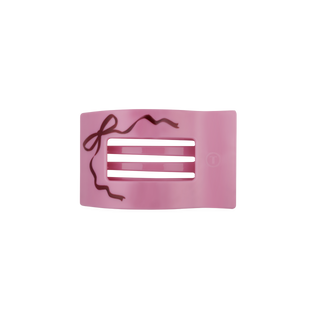 Pink flat rectangle hair clip with bow-shaped cutout detail and metal prongs