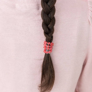 Small hair tie on dark braid, red and multicolor beaded band