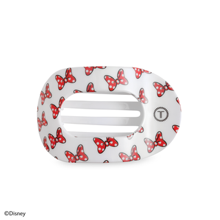 White hair clip with red Minnie bow print and silver bar.