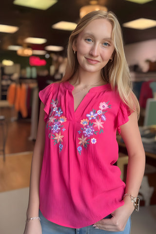 Fuchsia embroidered flower V-neck top with short ruffle sleeves