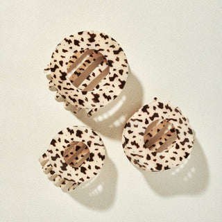 Teleties small flat circle hair clip in blonde tortoise, shown as a set