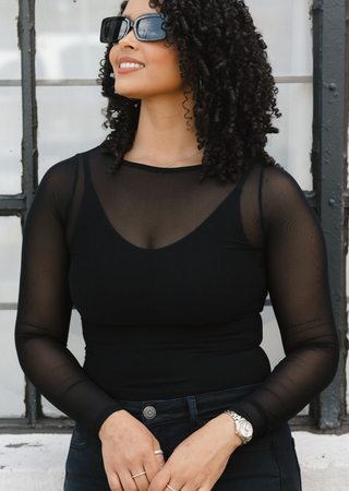 Elietian Seamless Sheer Mesh Top in Black over a black tank, front view with sunglasses