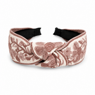 Blush floral woven headband with knot twist and embroidered rose pattern, black lining