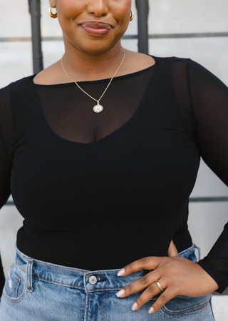 Elietian Seamless Sheer Mesh Top in Black over a black tank, close-up