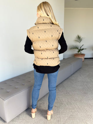 Ivory plus-size bow-pattern puffer vest with hood, front and back view
