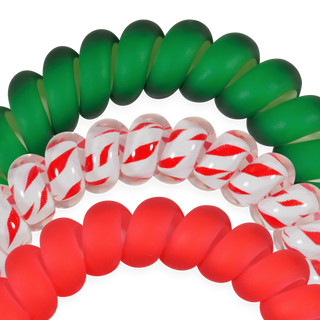 TELETIES close-up of beaded hair ties in green, red, and white with red-striped pattern