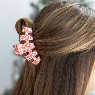 TELETIES all-tied up medium hair clip holding hair back; red and white abstract pattern