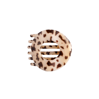 Flat circle hair clip in light blonde tortoise with brown spots and metal bar