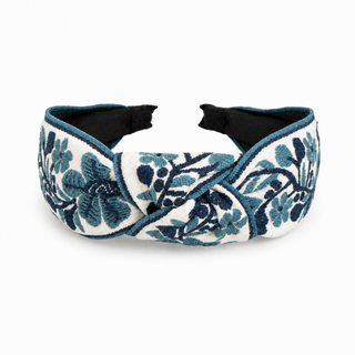 Navy floral woven headband with knot front and embroidered blossoms, black lining