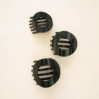 TELETIES three jet black flat circle hair clips with teeth and center bar