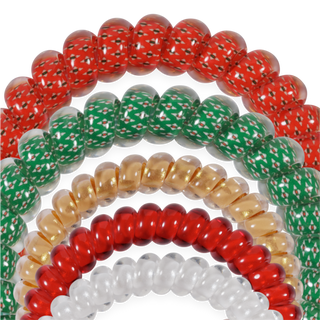 TELETIES close-up of coiled hair ties in red, white, cream, green, and orange patterns