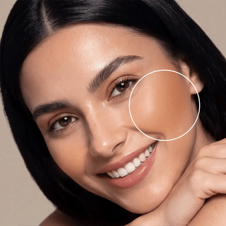 Air Bronzer Duo on skin with lifted smile, highlighting cheek and forehead glow