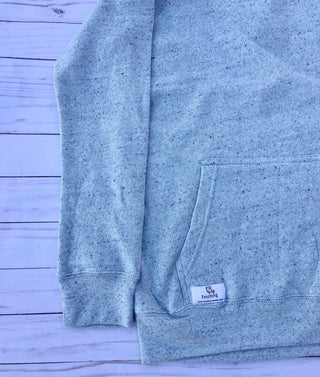 Fetching label sewn on the cowl neck sweatshirt pocket