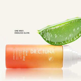 Dr. C. Tuna glow face mist bottle with orange cap and spray nozzle