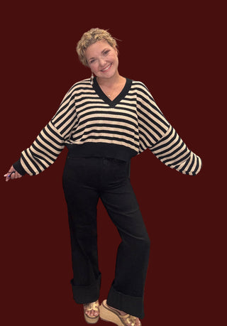 Judy Blue Jeans being featured in black with a matching sweater 