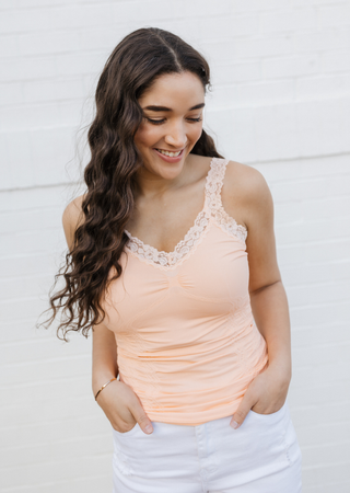 Peach ruched lace-trim cami with V-neck and thin shoulder straps