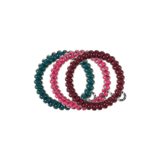 Teleties small spiral hair ties in Harvest Hues teal, berry plaid and burgundy, shown as a set