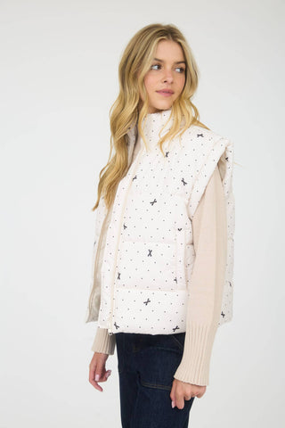 Polka Dot Puffer Vest with Bow Pattern