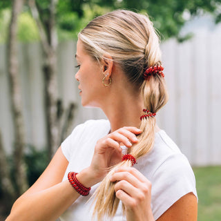 Large Red Carpet Ready TELETIES spiral hair tie holding a ponytail