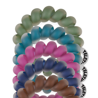 Teleties Sweater Swatches tiny spiral hair ties stacked in green, teal, pink, navy and brown
