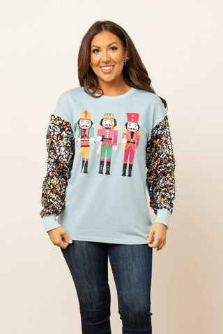 Nutcrackers on Blue with Sequin Sleeves