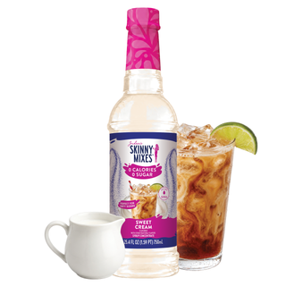 Jordan's Skinny Mixes sugar-free sweet cream dirty soda syrup bottle with white mug and iced drink with lime