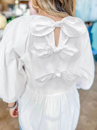 Bow Round Neck Three-Quarter Sleeve Blouse - Just Believe Boutique