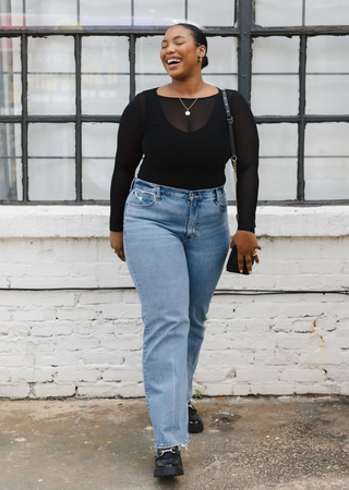 Elietian Seamless Sheer Mesh Top in Black with light jeans, full-length front view
