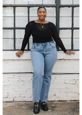 Elietian Seamless Sheer Mesh Top in Black with light straight leg jeans, full-length view