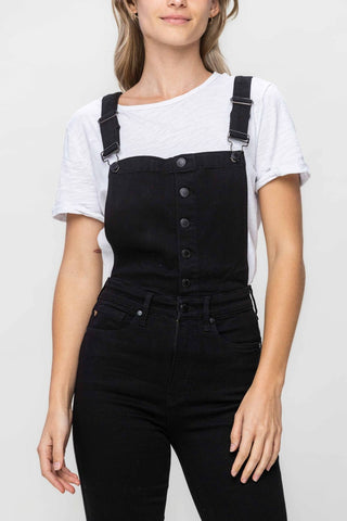 Judy Blue plus size black denim overalls close-up of front buttons, straps and pockets