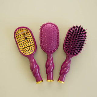Teleties mini vented hair brush in Mulberry, shown with full-size Mulberry brushes