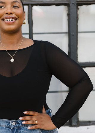 Elietian Seamless Sheer Mesh Top in Black, close-up of sheer sleeves and neckline