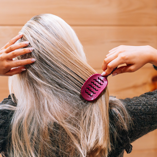 Teleties mini vented hair brush in Mulberry, shown in hair