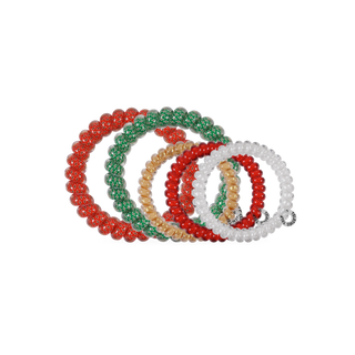 TELETIES assorted coiled hair ties in red, green, white, orange, and cream patterns