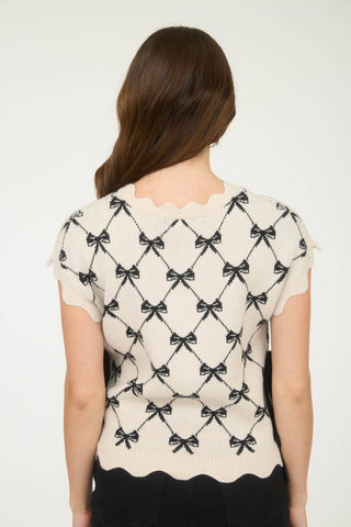 BOW PATTERN SHORT SLEEVE SIDE TIE KNIT PULLOVER