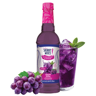 Jordan's Skinny Mixes grape soda syrup bottle with purple label and a glass of purple grape drink