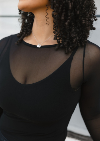 Elietian Seamless Sheer Mesh Top in Black, close-up of the neckline