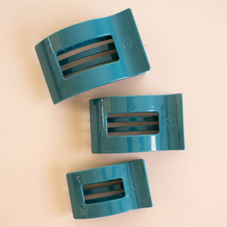 TELETIES three teal flat rectangle hair clips with ridged openings