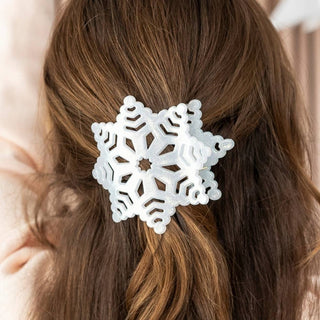 TELETIES white glitter snowflake flat hair clip clipped in brown hair